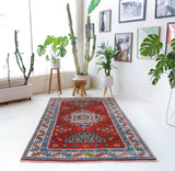Vintage Turkish rug in a living room setting, pile rug, Turkish rug, vintage rug, portland, rug shop, bright colors, wild shaman, soft rug, bold color, Portland, Oregon, rug store, rug shop, local shop, antique rug