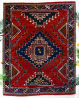 Vintage Turkish rug in a living room setting, pile rug, Turkish rug, vintage rug, portland, rug shop, bright colors, wild shaman, soft rug, bold color, Portland, Oregon, rug store, rug shop, local shop, antique rug