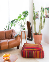 Foor pouf in a living room setting, pillow, turkish pillow, kilim pillow, home decor, decorative pillow, sham, rug pillow, decor, home decor, pouf, floor cushion, cushion, Portland, rugshop, Oregon, Wild Shaman, ottoman