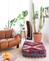 Foor pouf in a living room setting, pillow, turkish pillow, kilim pillow, home decor, decorative pillow, sham, rug pillow, decor, home decor, pouf, floor cushion, cushion, Portland, rugshop, Oregon, Wild Shaman, ottoman