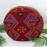 Foor pouf in a living room setting, pillow, turkish pillow, kilim pillow, home decor, decorative pillow, sham, rug pillow, decor, home decor, pouf, floor cushion, cushion, Portland, rugshop, Oregon, Wild Shaman, ottoman
