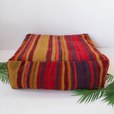 Foor pouf in a living room setting, pillow, turkish pillow, kilim pillow, home decor, decorative pillow, sham, rug pillow, decor, home decor, pouf, floor cushion, cushion, Portland, rugshop, Oregon, Wild Shaman, ottoman