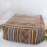 Foor pouf in a living room setting, pillow, turkish pillow, kilim pillow, home decor, decorative pillow, sham, rug pillow, decor, home decor, pouf, floor cushion, cushion, Portland, rugshop, Oregon, Wild Shaman, ottoman