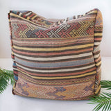 Foor pouf in a living room setting, pillow, turkish pillow, kilim pillow, home decor, decorative pillow, sham, rug pillow, decor, home decor, pouf, floor cushion, cushion, Portland, rugshop, Oregon, Wild Shaman, ottoman