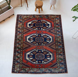 Vintage Turkish rug in a living room setting, pile rug, Turkish rug, vintage rug, portland, rug shop, bright colors, wild shaman, soft rug, bold color, Portland, Oregon, rug store, rug shop, local shop