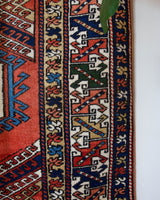 Vintage Turkish rug in a living room setting, pile rug, Turkish rug, vintage rug, portland, rug shop, bright colors, wild shaman, soft rug, bold color, Portland, Oregon, rug store, rug shop, local shop