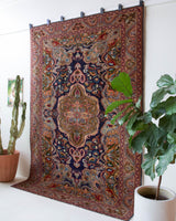 Vintage Turkish rug in a living room setting, pile rug, Turkish rug, vintage rug, portland, rug shop, bright colors, wild shaman, soft rug, bold color, Portland, Oregon, rug store, rug shop, local shop, antique rug,