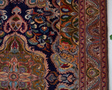 Vintage Turkish rug in a living room setting, pile rug, Turkish rug, vintage rug, portland, rug shop, bright colors, wild shaman, soft rug, bold color, Portland, Oregon, rug store, rug shop, local shop, antique rug,