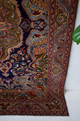 Vintage Turkish rug in a living room setting, pile rug, Turkish rug, vintage rug, portland, rug shop, bright colors, wild shaman, soft rug, bold color, Portland, Oregon, rug store, rug shop, local shop, antique rug