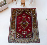 Vintage Turkish rug in a living room setting, pile rug, Turkish rug, vintage rug, portland, rug shop, bright colors, wild shaman, soft rug, bold color, Portland, Oregon, rug store, rug shop, local shop