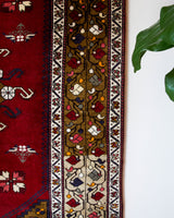 Vintage Turkish rug in a living room setting, pile rug, Turkish rug, vintage rug, portland, rug shop, bright colors, wild shaman, soft rug, bold color, Portland, Oregon, rug store, rug shop, local shop