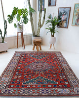 Vintage Turkish rug in a living room setting, pile rug, Turkish rug, vintage rug, portland, rug shop, bright colors, wild shaman, soft rug, bold color, Portland, Oregon, rug store, rug shop, local shop