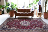 Vintage Turkish rug in a living room setting, pile rug, Turkish rug, vintage rug, portland, rug shop, bright colors, wild shaman, soft rug, bold color, Portland, Oregon, rug store, rug shop, local shop, antique rug