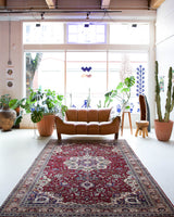 Vintage Turkish rug in a living room setting, pile rug, Turkish rug, vintage rug, portland, rug shop, bright colors, wild shaman, soft rug, bold color, Portland, Oregon, rug store, rug shop, local shop, antique rug