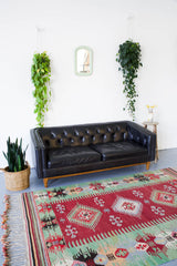 orange, green, bright color, antique, oushak rug, portland rug shop, rug store, wild shaman