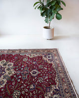 Vintage Turkish rug in a living room setting, pile rug, Turkish rug, vintage rug, portland, rug shop, bright colors, wild shaman, soft rug, bold color, Portland, Oregon, rug store, rug shop, local shop, antique rug