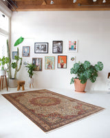 Vintage Turkish rug in living room setting, old rug, antique rug, pastel colors, faded colors, Turkish rug, vintage rug, soft rug, Portland, Oregon, rug store, rug shop, local shop