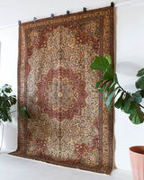 Vintage Turkish rug in living room setting, old rug, antique rug, pastel colors, faded colors, Turkish rug, vintage rug, soft rug, Portland, Oregon, rug store, rug shop, local shop