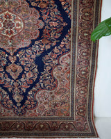 Vintage Turkish rug in a living room setting, pile rug, Turkish rug, vintage rug, portland, rug shop, bright colors, wild shaman, soft rug, bold color, Portland, Oregon, rug store, rug shop, local shop, antique rug