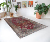 Vintage Turkish rug in a living room setting, pile rug, Turkish rug, vintage rug, portland, rug shop, bright colors, wild shaman, soft rug, bold color, Portland, Oregon, rug store, rug shop, local shop, antique rug