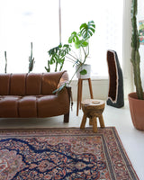 Vintage Turkish rug in a living room setting, pile rug, Turkish rug, vintage rug, portland, rug shop, bright colors, wild shaman, soft rug, bold color, Portland, Oregon, rug store, rug shop, local shop, antique rug