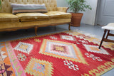 orange, green, bright color, antique, oushak rug, portland rug shop, rug store, wild shaman