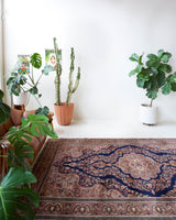 Vintage Turkish rug in a living room setting, pile rug, Turkish rug, vintage rug, portland, rug shop, bright colors, wild shaman, soft rug, bold color, Portland, Oregon, rug store, rug shop, local shop, antique rug