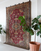 Vintage Turkish rug in a living room setting, pile rug, Turkish rug, vintage rug, portland, rug shop, bright colors, wild shaman, soft rug, bold color, Portland, Oregon, rug store, rug shop, local shop, antique rug