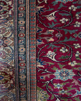 Vintage Turkish rug in a living room setting, pile rug, Turkish rug, vintage rug, portland, rug shop, bright colors, wild shaman, soft rug, bold color, Portland, Oregon, rug store, rug shop, local shop, antique rug