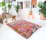 Vintage Turkish rug in living room setting, old rug, antique rug, pastel colors, faded colors, Turkish rug, vintage rug, soft rug, Portland, Oregon, rug store, rug shop, local shop