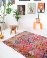 Vintage Turkish rug in living room setting, old rug, antique rug, pastel colors, faded colors, Turkish rug, vintage rug, soft rug, Portland, Oregon, rug store, rug shop, local shop