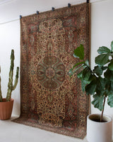 Vintage Turkish  rug in room decor setting, old rug, antique rug, pastel colors, faded colors, Turkish rug, vintage rug, soft rug, Portland, Oregon, rug store, rug shop, local shop,  bright colors, bold colors