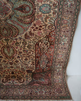 Vintage Turkish mini rug in room decor setting, old rug, antique rug, pastel colors, faded colors, Turkish rug, vintage rug, soft rug, Portland, Oregon, rug store, rug shop, local shop,  bright colors, bold colors