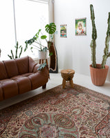 Vintage Turkish  rug in room decor setting, old rug, antique rug, pastel colors, faded colors, Turkish rug, vintage rug, soft rug, Portland, Oregon, rug store, rug shop, local shop,  bright colors, bold colors