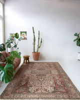 Vintage Turkish rug in room decor setting, old rug, antique rug, pastel colors, faded colors, Turkish rug, vintage rug, soft rug, Portland, Oregon, rug store, rug shop, local shop,  bright colors, bold colors