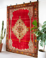 Vintage Turkish rug in a living room setting, pile rug, Turkish rug, vintage rug, portland, rug shop, bright colors, wild shaman, soft rug, bold color, Portland, Oregon, rug store, rug shop, local shop, antique rug