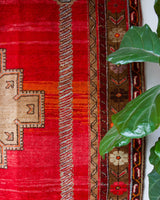 Vintage Turkish rug in a living room setting, pile rug, Turkish rug, vintage rug, portland, rug shop, bright colors, wild shaman, soft rug, bold color, Portland, Oregon, rug store, rug shop, local shop, antique rug