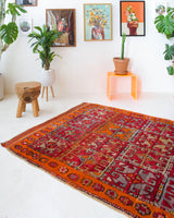 Vintage Turkish rug in a living room setting, pile rug, Turkish rug, vintage rug, portland, rug shop, bright colors, wild shaman, soft rug, bold color, Portland, Oregon, rug store, rug shop, local shop, antique rug