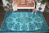 Vintage Overdyed Isparta Rug in coral 5.6ftx9.8ft