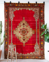 Vintage Turkish rug in a living room setting, pile rug, Turkish rug, vintage rug, portland, rug shop, bright colors, wild shaman, soft rug, bold color, Portland, Oregon, rug store, rug shop, local shop, antique rug