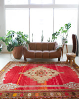 Vintage Turkish rug in a living room setting, pile rug, Turkish rug, vintage rug, portland, rug shop, bright colors, wild shaman, soft rug, bold color, Portland, Oregon, rug store, rug shop, local shop, antique rug