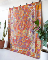 Vintage kilim rug in living room setting, bright colors, wild shaman, soft rug, bold color, Portland, Oregon, rug store, rug shop, local shop, vintage rug, modern kilim, warm colors