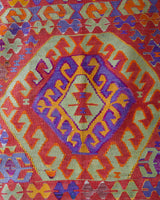 Vintage kilim rug in living room setting, bright colors, wild shaman, soft rug, bold color, Portland, Oregon, rug store, rug shop, local shop, vintage rug, modern kilim, warm colors