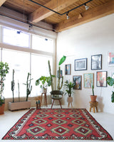 Vintage kilim rug in living room setting, bright colors, wild shaman, soft rug, bold color, Portland, Oregon, rug store, rug shop, local shop, vintage rug, modern kilim, warm colors