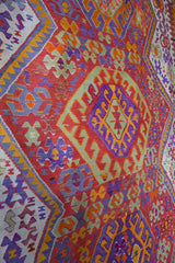 Vintage kilim rug in living room setting, bright colors, wild shaman, soft rug, bold color, Portland, Oregon, rug store, rug shop, local shop, vintage rug, modern kilim, warm colors