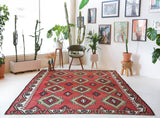 Vintage kilim rug in living room setting, bright colors, wild shaman, soft rug, bold color, Portland, Oregon, rug store, rug shop, local shop, vintage rug, modern kilim, warm colors