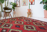 Vintage kilim rug in living room setting, bright colors, wild shaman, soft rug, bold color, Portland, Oregon, rug store, rug shop, local shop, vintage rug, modern kilim, warm colors