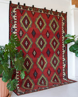 Vintage kilim rug in living room setting, bright colors, wild shaman, soft rug, bold color, Portland, Oregon, rug store, rug shop, local shop, vintage rug, modern kilim, warm colors