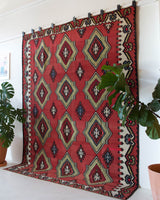 Vintage kilim rug in living room setting, bright colors, wild shaman, soft rug, bold color, Portland, Oregon, rug store, rug shop, local shop, vintage rug, modern kilim, warm colors