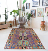 Vintage kilim rug in living room setting, bright colors, wild shaman, soft rug, bold color, Portland, Oregon, rug store, rug shop, local shop, vintage rug, modern kilim, warm colors
